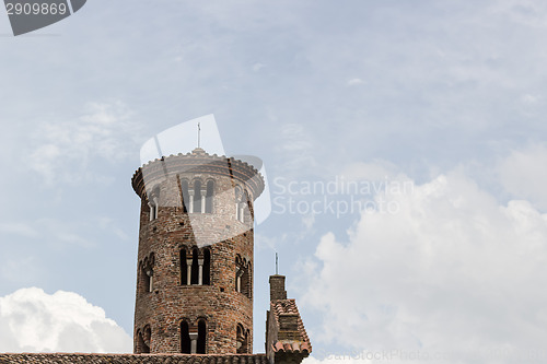 Image of Romanesque cylindrical bell tower of countryside church