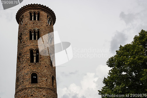 Image of Romanesque cylindrical bell tower of countryside church