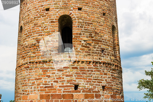 Image of Romanesque cylindrical bell tower of countryside church