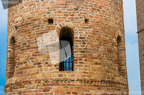 Image of Romanesque cylindrical bell tower of countryside church