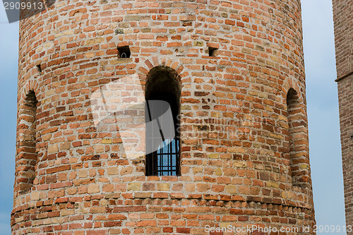 Image of Romanesque cylindrical bell tower of countryside church