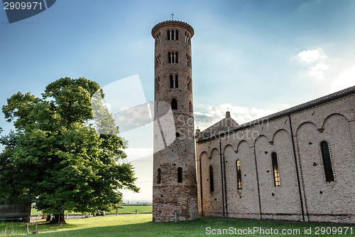 Image of Romanesque cylindrical bell tower of countryside church