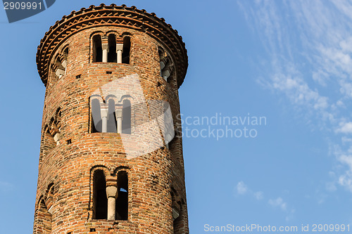 Image of Romanesque cylindrical bell tower of countryside church