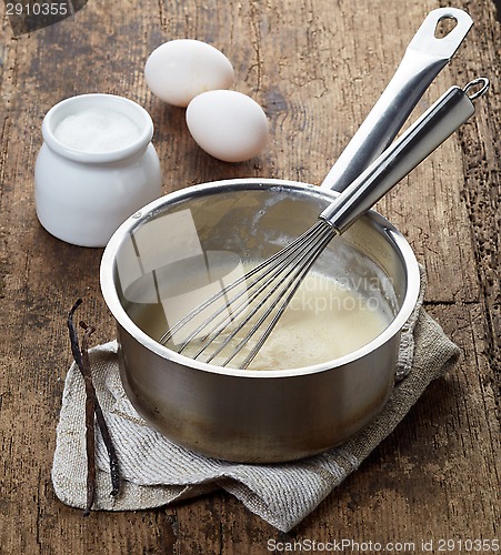 Image of making vanilla sauce