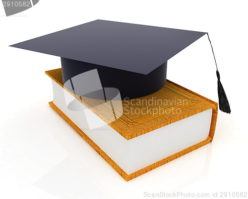 Image of Graduation hat on a leather book