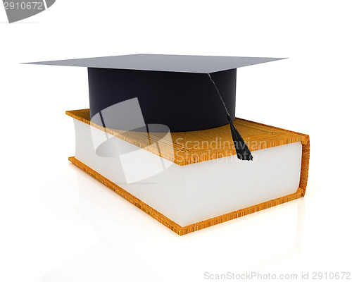 Image of Graduation hat on a leather book