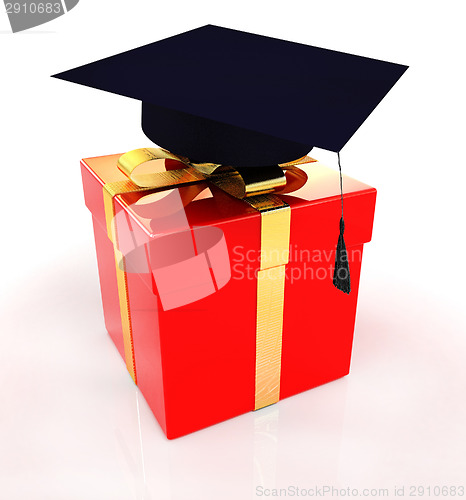 Image of graduation hat on a red gift