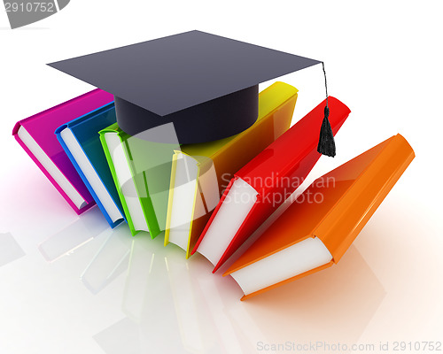 Image of Colorful books and graduation hat 