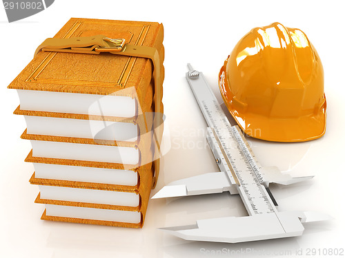 Image of Vernier caliper, leather books and yellow hard hat 