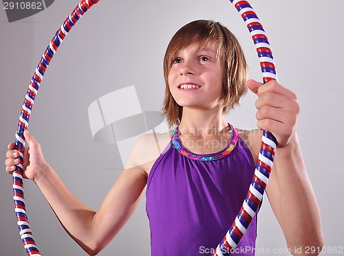 Image of child exercising with a hoop