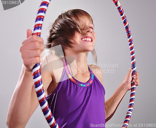 Image of child exercising with a hoop