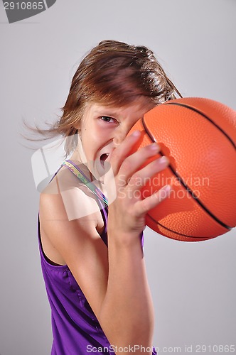 Image of child exercising with ball