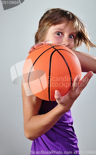 Image of child exercising with ball