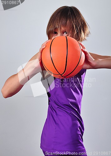 Image of child exercising with ball