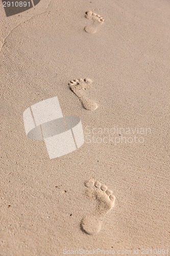 Image of footprints on sand
