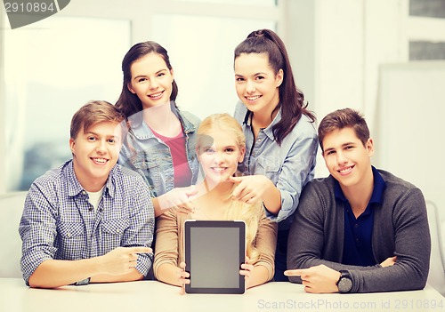 Image of smiling students with blank tablet pc screen