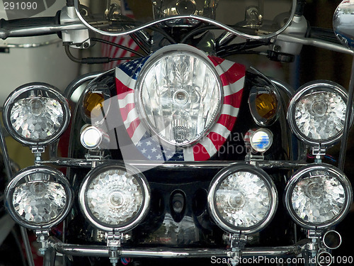 Image of Detail of scooter with lots of light