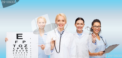 Image of smiling female eye doctors and nurses