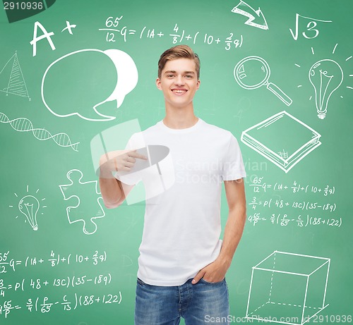 Image of smiling young man in blank white t-shirt