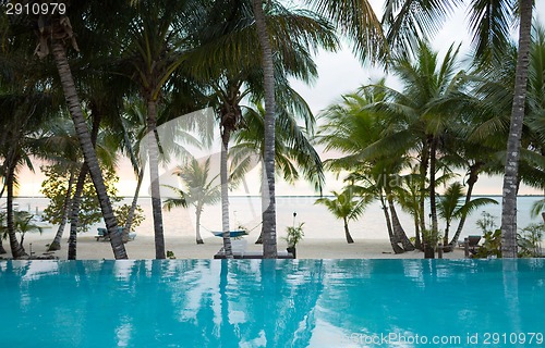 Image of swimming pool on tropical beach