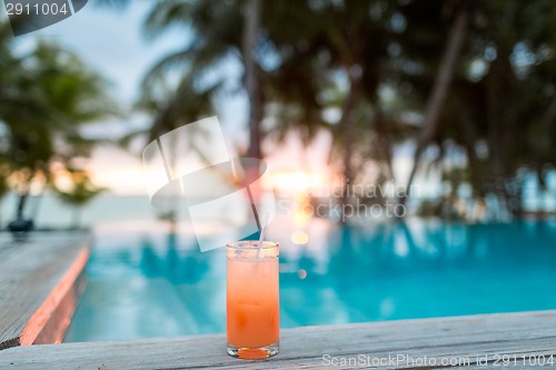 Image of cocktail drink on tropical beach