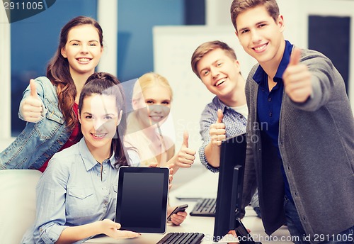 Image of students with monitor and blank tablet pc screen