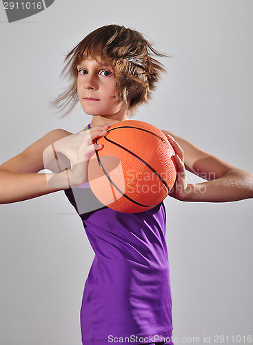 Image of child exercising with ball