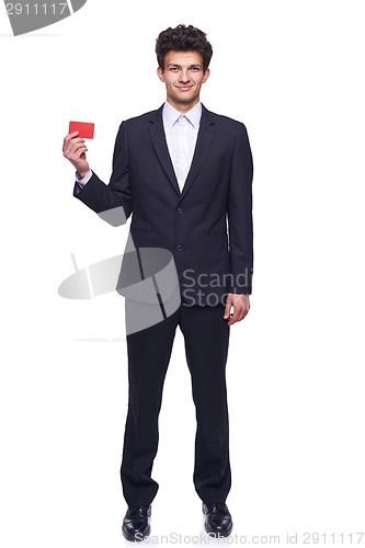 Image of Smiling business man showing blank credit card