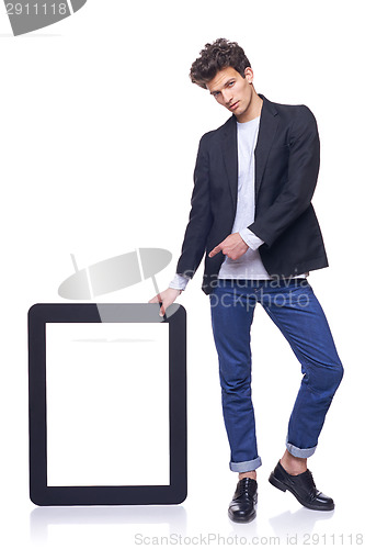 Image of Full length man holding empty frame