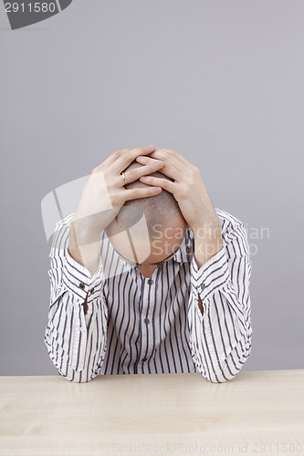 Image of Man at desk