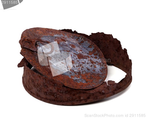 Image of Old rusty tin can on white background