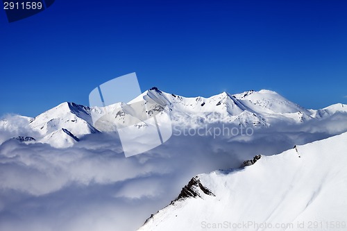 Image of Mountains in clouds at nice day