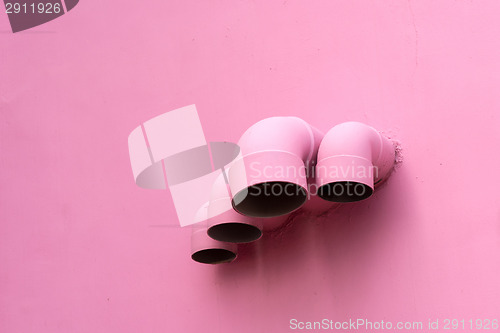 Image of Pink pipes on wall