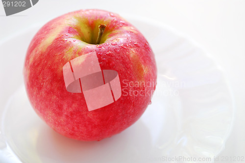 Image of Red apple on a plate