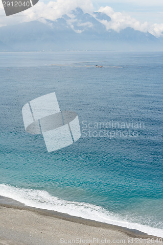 Image of Seascape with cloudy sky