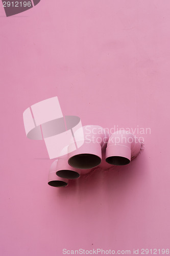 Image of Pink pipes on wall