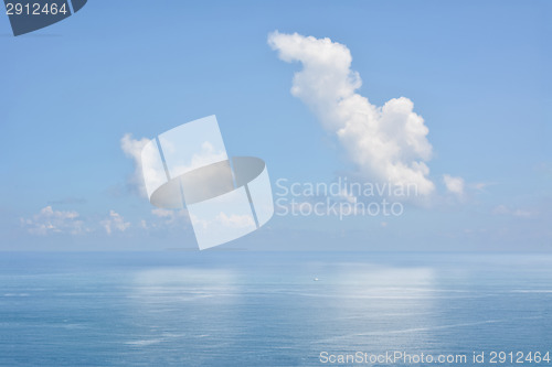 Image of Clouds above a surface of the sea