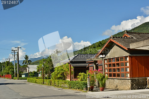 Image of Wooden house and street 