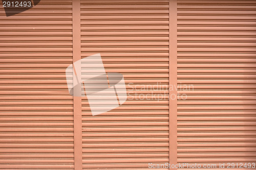 Image of Brown shutters of window