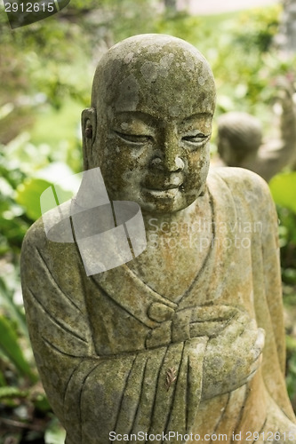 Image of Ruined statue Ksitigarbha Bodhisattva 