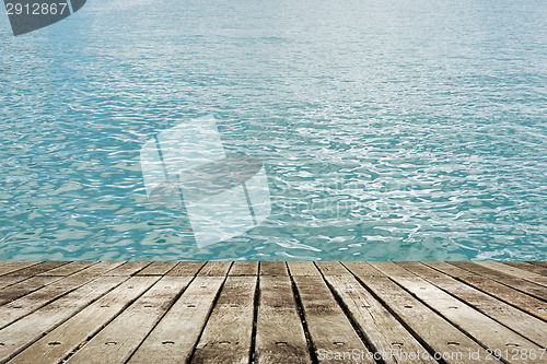 Image of lake with wooden ground