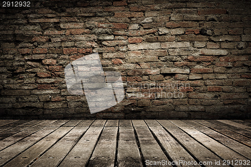 Image of Wooden ground with grunge wall