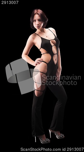 Image of Pretty woman in sexy overalls
