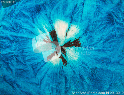 Image of Blue crumpled handmade paper texture with floral pattern