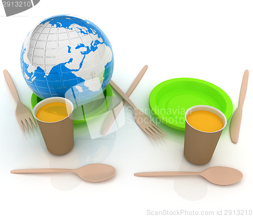 Image of Orange juice in a fast food dishes and earth