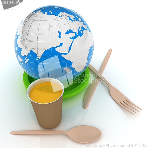 Image of Orange juice in a fast food dishes and earth