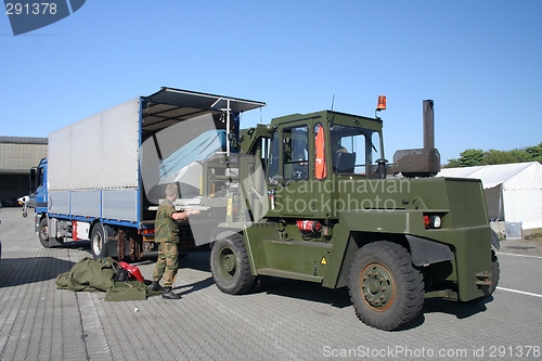 Image of Big military forklift in action