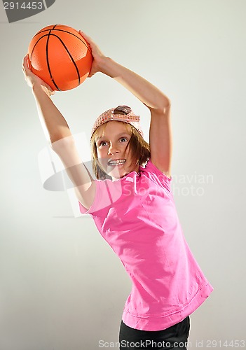 Image of child exercising with a ball