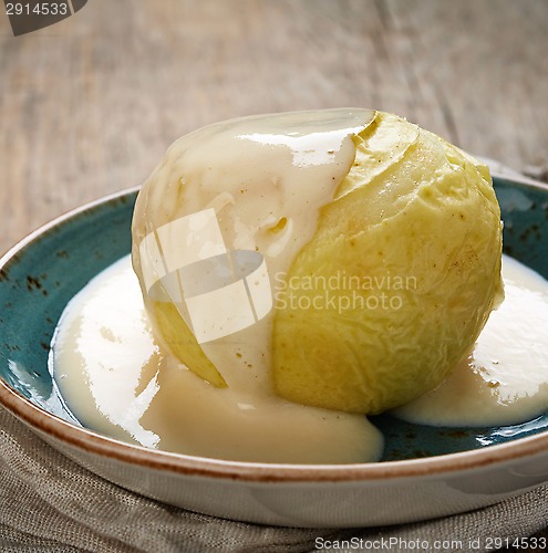 Image of baked apple with vanilla sauce