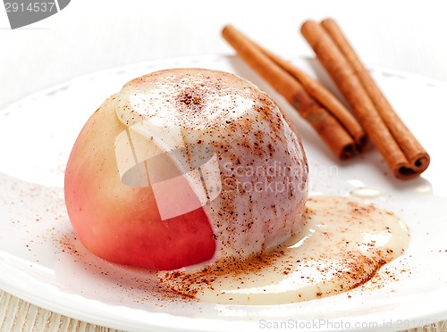 Image of baked apple dessert with vanilla sauce